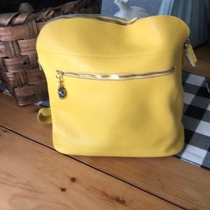 Buttery yellow leather with blue suede interior Italian backpack